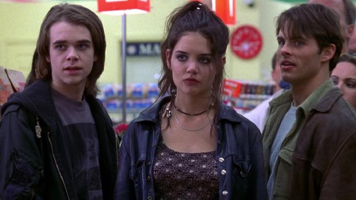 Disturbing Behavior: Two teen boys and a teen girl stand in a high-school cafeteria