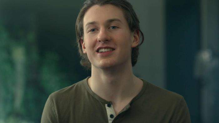 Don't Die: The Man Who Wants to Live Forever movie: White teenage man in dark green shirt speaks to camera in living room