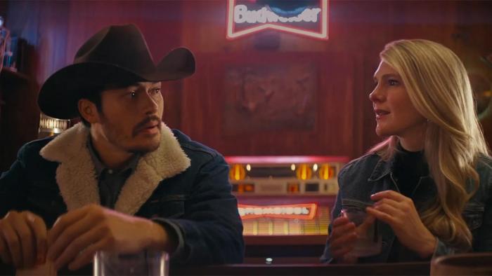 Downtown Owl: Main character Julia and love interest Vance seated side by side at a bar.