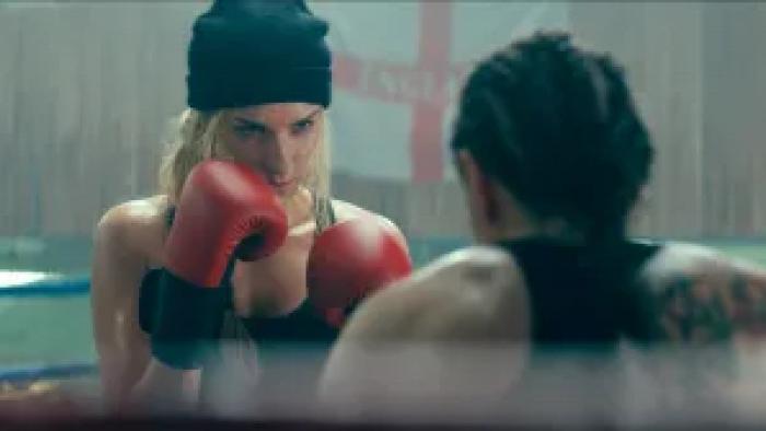 Duchess: Charlotte Kirk holds her fists up in front of her in a boxing ring, her opponent seen from behind