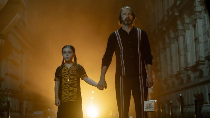 Dust Bunny Movie: Aurora and the neighbor walk down an alley at night holding hands