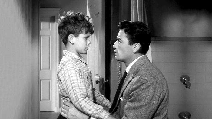 Gentleman's Agreement: A father consoles his son