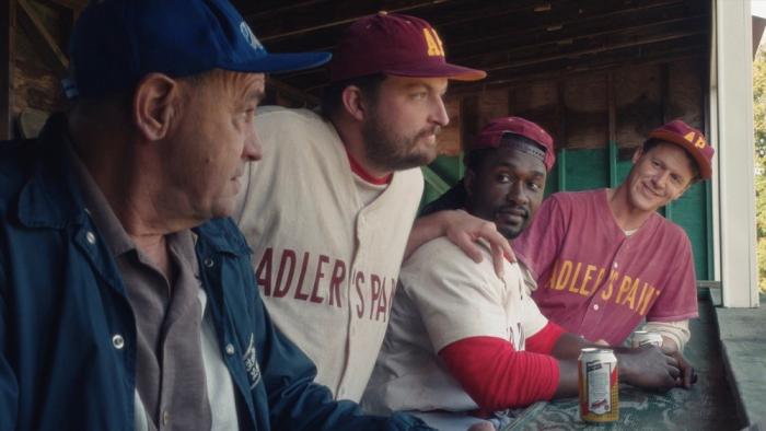 Eephus movie: Cliff Blake looks down at the baseball field with Adler Paint baseball players