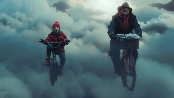 Elf Me: Trip and Elia ride bikes. 