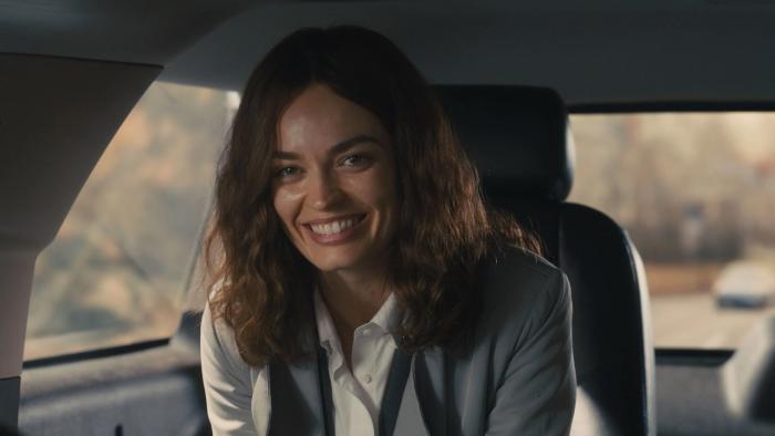 Ella McCay movie: Ella McCay (Emma Mackey) smiles