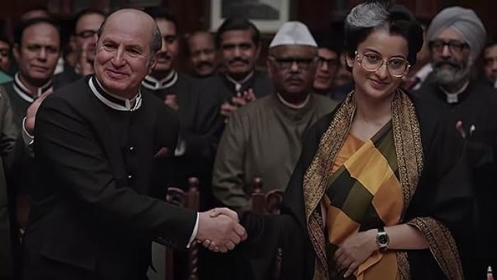 Emergency: Kangana Ranaut as Prime Minister Indira Gandhi shaking hands with a man with a crowd behind them