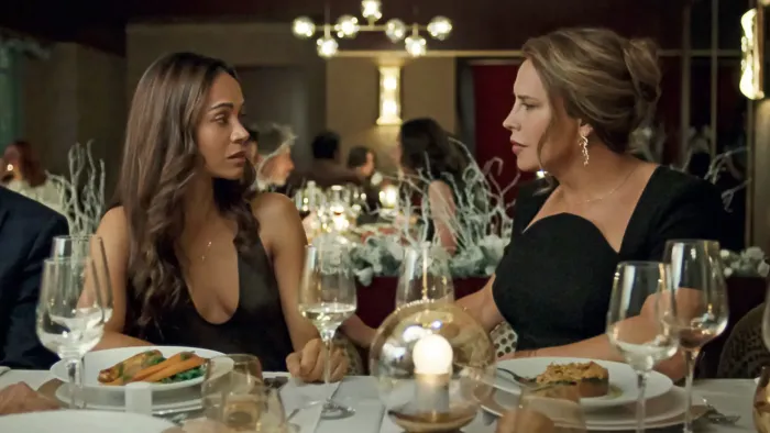Emilia Pérez: Zoe Saldaña and Karla Sofía Gascón at dinner.