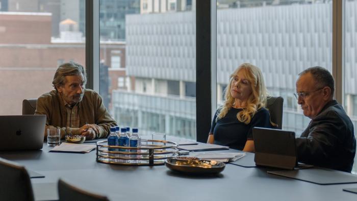 Ex-Husbands movie: Griffin Dunne and Rosanna Arquette sit at a conference table with divorce lawyers