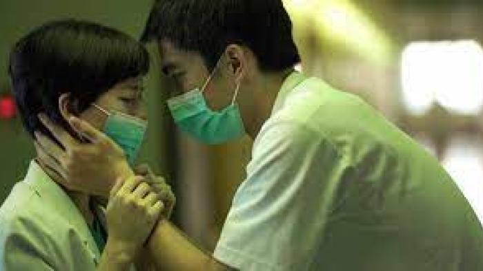 Eye of the Storm: Health care workers comfort each other