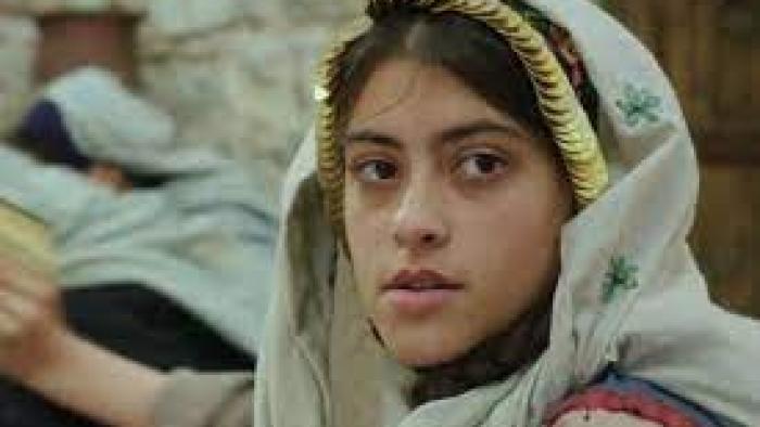 Farha: a girl looks at the camera