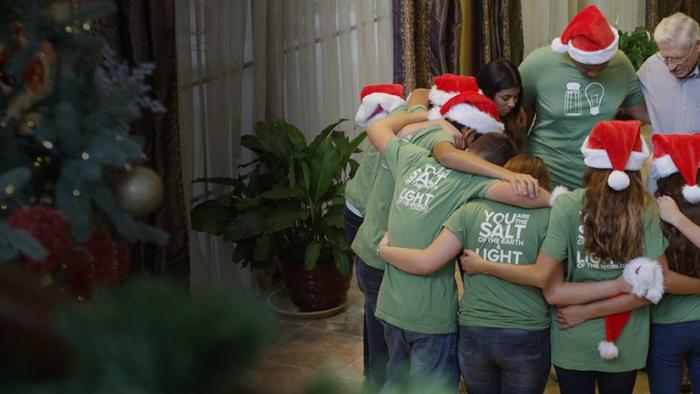 Faith Filled Christmas Movie: Huddled in prayer