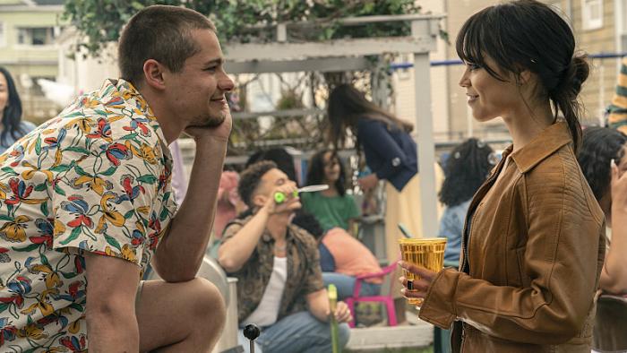 Finestkind Movie: Toby Wallace smiles goofily at Jenna Ortega at an outdoor barbecue
