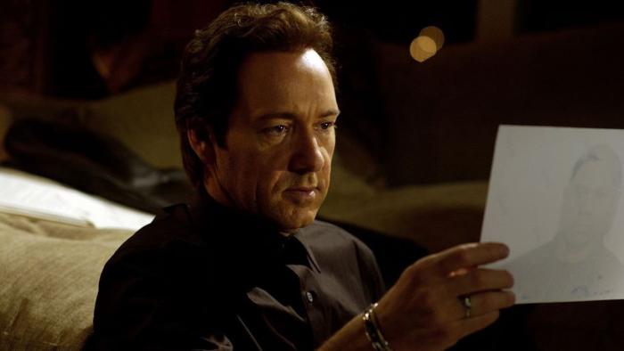 Edison: Kevin Spacey looks at a picture