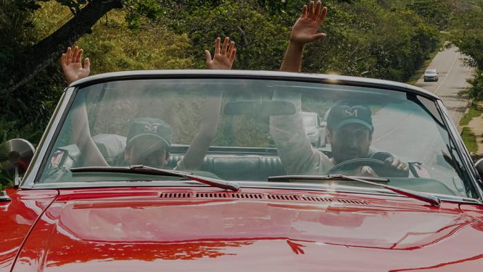 Flywheel: Ignition of the Soul movie: Mario Bregieira rides in a 1965 Ford Mustang convertible with Guilherme Tavares