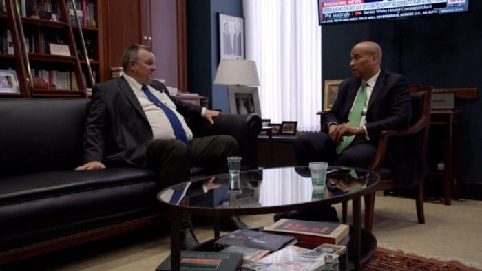 Food, Inc. 2 Movie: Senators Jon Tester and Cory Booker sit in an office and discuss ways to change the food industry