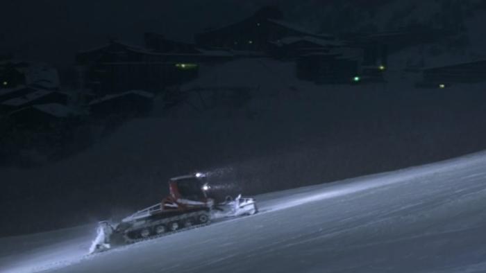 Force Majeure: A snowplow in snow going up a mountain