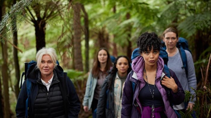 Force of Nature: The Dry 2 Movie: Five women wearing backpacks prepare for a hike through Australia's dense woods
