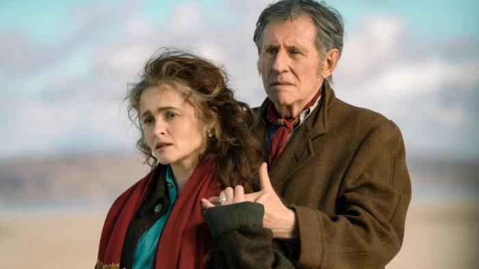 Four Letters of Love: Helena Bonham Carter and Gabriel Byrne look sad as they hold hands on the beach