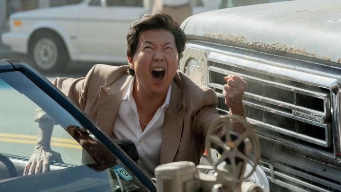 The 4:30 Movie: Manager Mike (Ken Jeong) screams at the heavens when a truck crashes into his fancy car