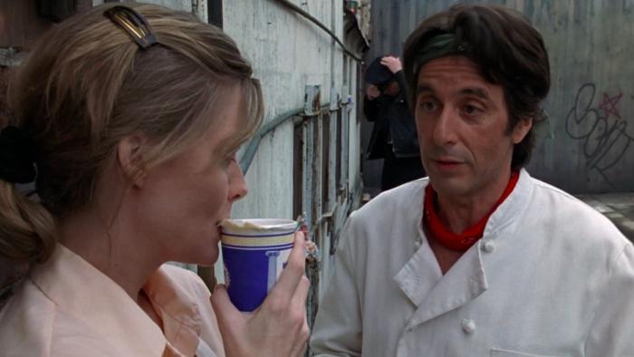 Frankie and Johnny: Michelle Pfeiffer and Al Pacino talking outside.