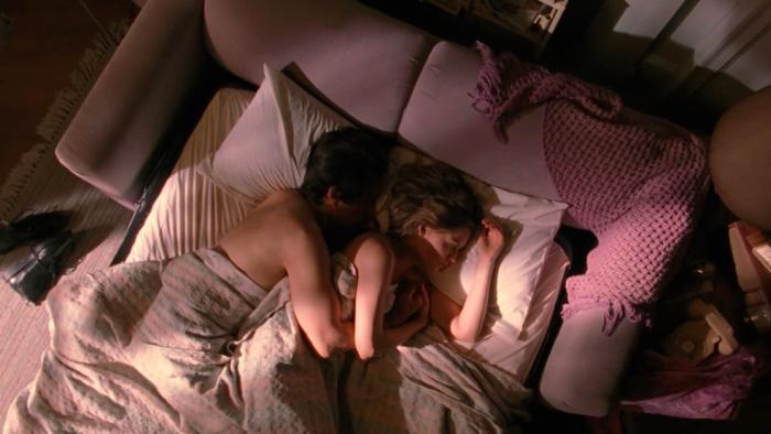Frankie and Johnny: Michelle Pfeiffer and Al Pacino lying in bed together.