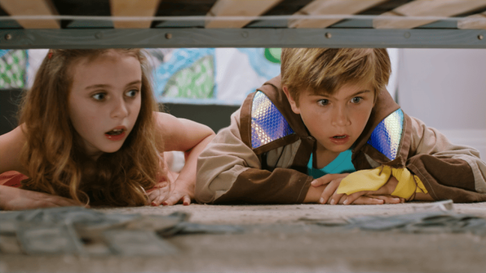 The Furry Fortune: kids look under a bed at wads of money