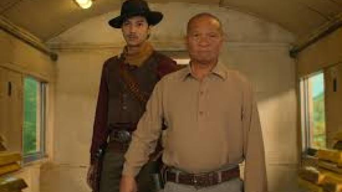 Gold Rush Gang: 2 Asian men, one with cowboy hat