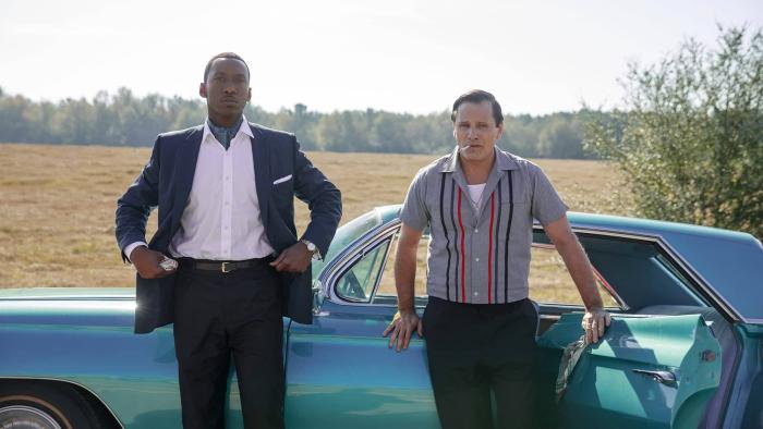 Green Book Movie: Dr. Don Shirley and Tony Lip standing by the car