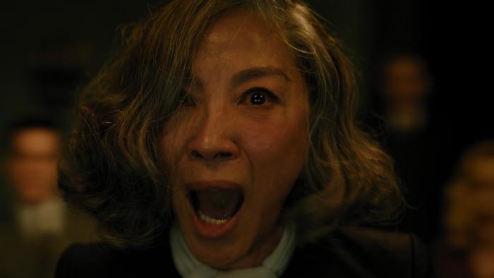 A Haunting in Venice Movie: Medium Joyce Reynolds (Michelle Yeoh) experiences something terrifying during a séance