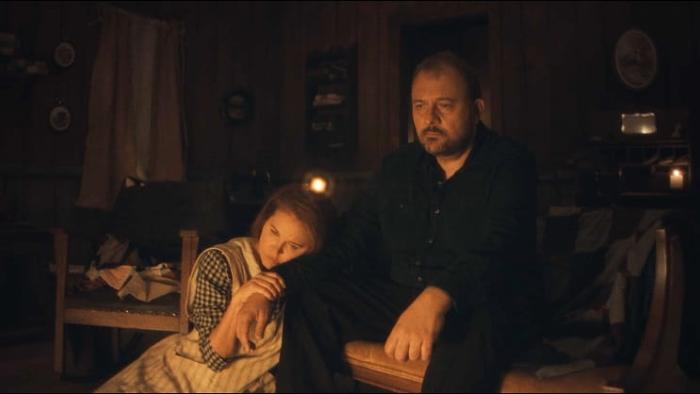 Hazel's Heart movie: William and Blanche hold each other in front of their fireplace