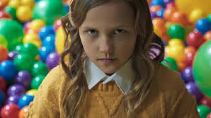 Hive Movie: Angry girl glares from ball pit