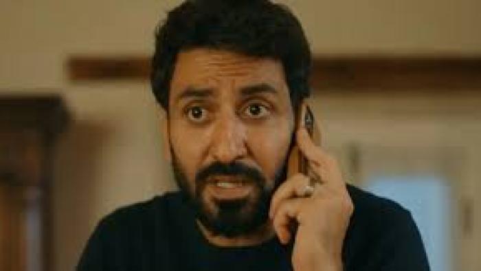 Honeymoonish: Man on phone looks surprised