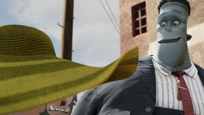 Hotel Transylvania Movie: Frankenstein looks down at a green, wide-brimmed hat with a small smile