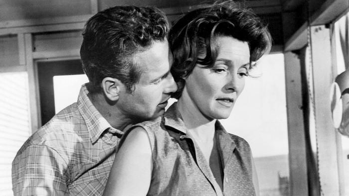 Hud: Paul Newman stands behind Patricia Neal, leaning into her neck