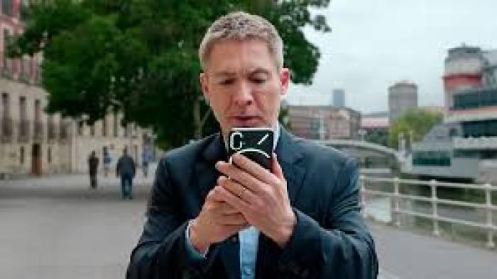 I Can't Live Without You: man on his cellphone