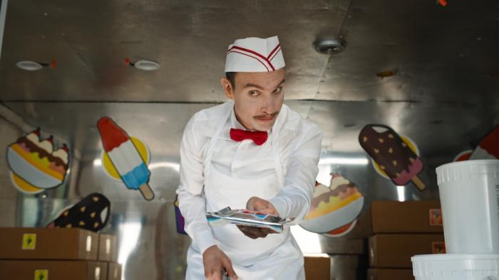Ice Cream Man Movie: A creepy-looking Ice Cream Man hands someone a treat from the window of a truck