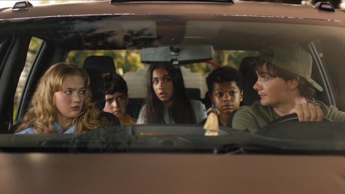 Ice Cream Man Movie: Lizzie, her younger brother, Jared, and two other kids ride in a car driven by older teen Chris