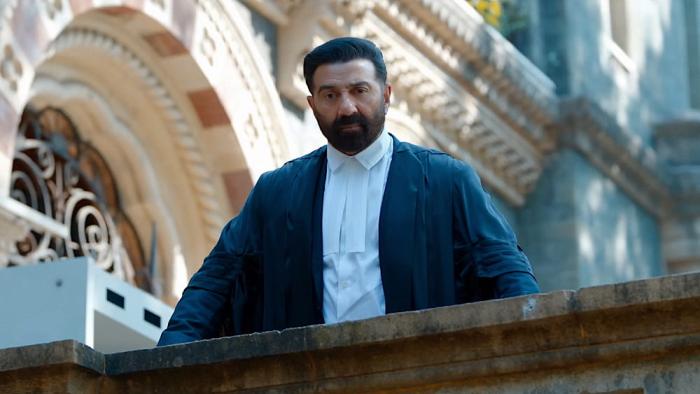 Ikka movie: Sunny Deol stands overlooking a staircase at the courtroom building