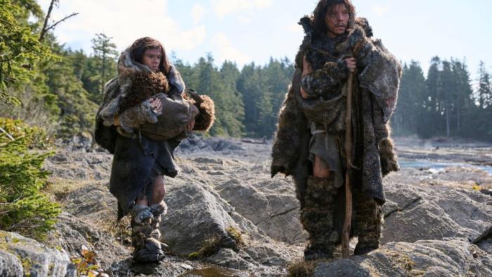 In the Blink of an Eye movie: Neanderthals Thorn and Lark walk along a rocky path