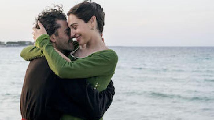 In the Hand of Dante: Oscar Isaac and Gal Gadot embrace.