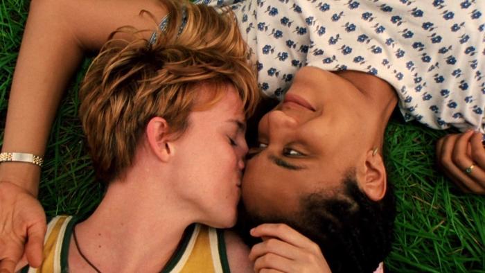 The Incredibly True Adventure of Two Girls: Laurel Holloman and Nicole Ari Parker lay on the ground