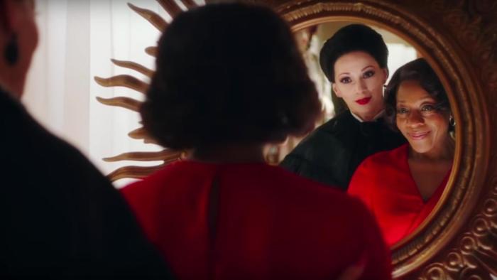 In Fabric Movie: Miss Luckmoore helps Sheila try on the red dress