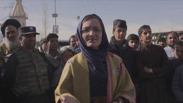 Zarifa Ghafari meeting and speaking with the public.