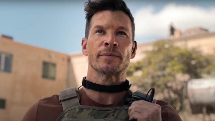 Sniper -- The Last Stand movie: Chad Michael Collins wearing combat gear