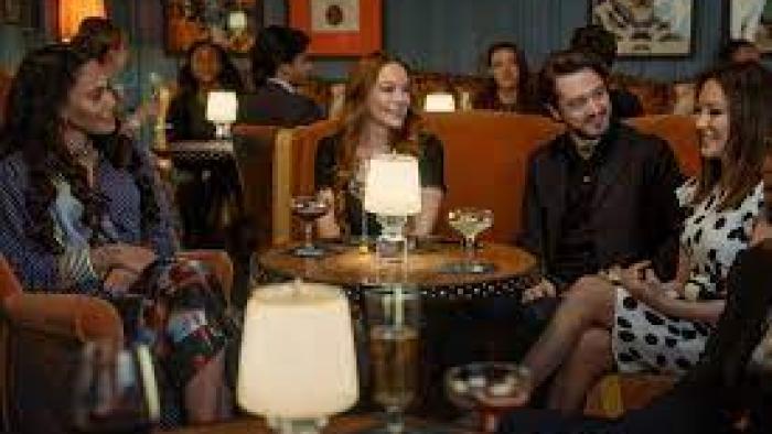 Irish Wish: Lindsay Lohan and a group of friends at a bar.