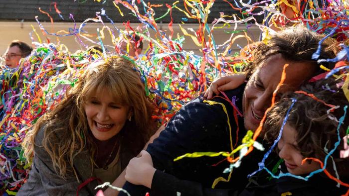 Is This Thing On? movie: The Novak family laugh and shield themselves from streamers