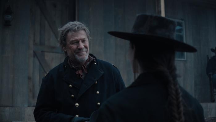 The Isolate Thief Movie: Wearing a Union uniform, "Fiddler" John smiles at Ada, whose back is to viewers