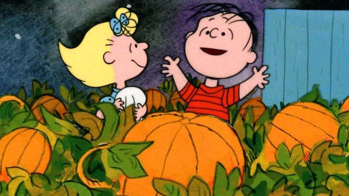 It's the Great Pumpkin, Charlie Brown Movie: Sally listens raptly to Linus as he tells a story in the pumpkin patch