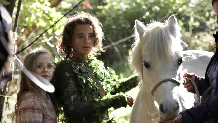 Jessie and the Elf Boy: a young girl and an elf with a pony