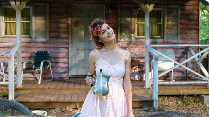 The Jesus Rolls Movie: Marie holding coffee pot